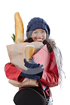 Happy woman carrying loads