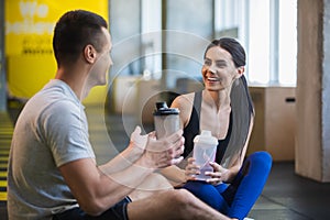 Happy woman is chatting with friend indoors