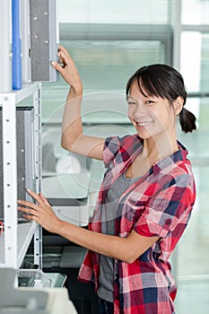 Happy woman choosing folder