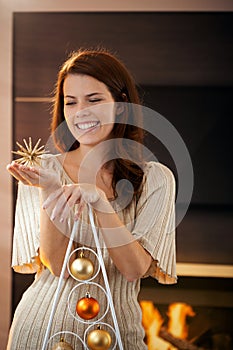 Happy woman with christmas star