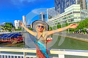 Happy woman at Clarke Quay