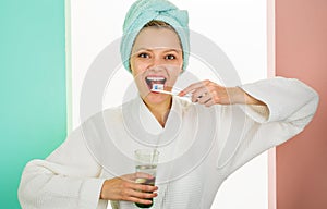 Happy woman cleaning teeth with Toothbrush and Toothpaste. Whitening teeth. Oral care. Dental higiene. Morning photo