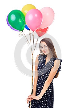 Happy woman with colorful balloons