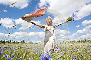 Happy woman in corn field