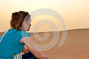 Happy woman in desert