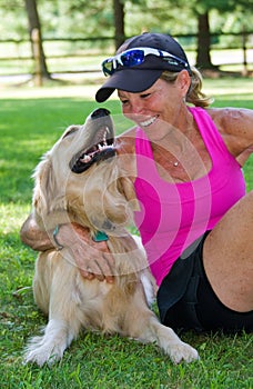 Happy woman with dog photo