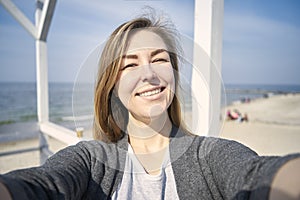 Happy woman doing selfie outdoor