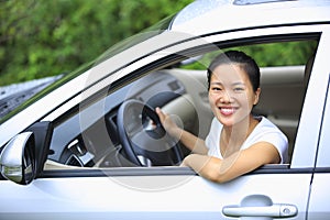 Happy woman driving