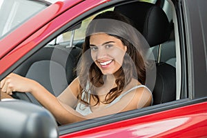 Happy Woman Driving Car