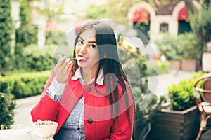 Happy woman eating