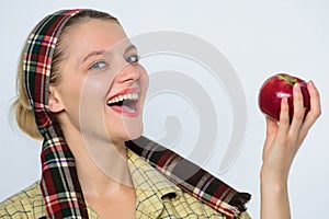 Happy woman eating apple. orchard, gardener girl with apple basket. vitamin and dieting food. organic and vegetarian