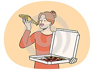 Happy woman eating pizza from box