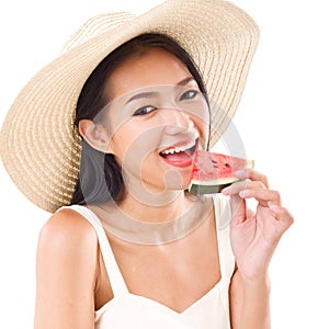 Happy woman eating watermelon