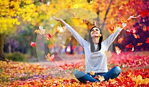 Happy Woman Enjoying Life in the Autumn