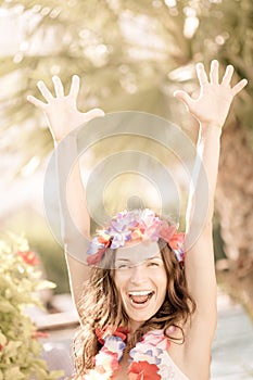 Happy woman enjoying sun on the beach