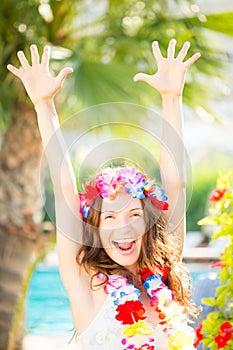 Happy woman enjoying sun on the beach