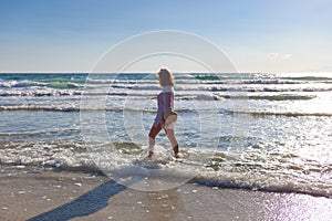 Happy woman enjoying on your holiday in Greece on Thasos island