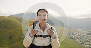 Happy woman, face and backpack with mountain for hiking, adventure or outdoor journey in nature. Portrait of female