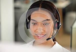 Happy, woman and face at call centre, closeup for customer service, telemarketing and technical support. Female