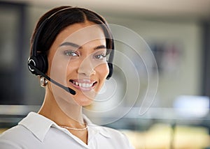 Happy, woman and face at call centre, closeup for telemarketing, customer service and technical help. Excited, female