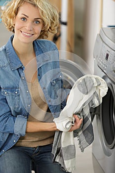 Happy woman with fresh laundry