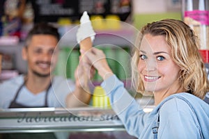 happy woman getting ice cream