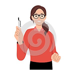 Happy woman in glasses holding large notepad in hands and with smile making note or plan for day. Positive girl standing with book