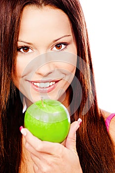 Happy woman with green apple