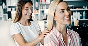 Happy woman at the hair salon