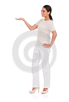 Happy, woman and hand pointing to mockup in studio for announcement, presentation or info on white background. Smile