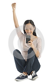 Happy Woman With Hand Raised Using Smart Phone