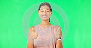 Happy woman, hands and thumbs up on green screen for fitness, agreement or winning against a studio background. Portrait