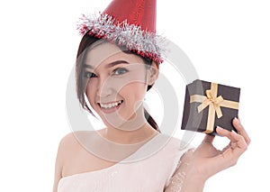 Happy woman with hat and holding a christmas gift box isolated o