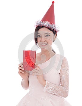 happy woman with hat and holding a red christmas gift box isolated on a white background