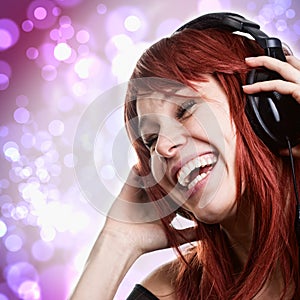 Happy woman having fun with music headphones