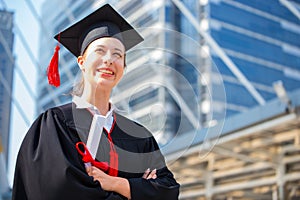 Happy woman on her graduation day University. Education and people