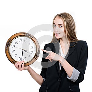 Happy woman holding clock