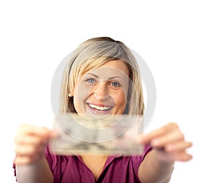 Happy woman holding dollars
