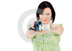 Happy woman holding home video camera