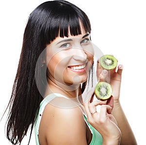 Happy woman holding kiwi