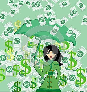 Happy woman holding an umbrella in a money rain