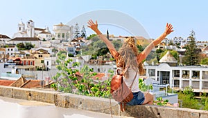 Happy woman holiday maker travel in Portugal