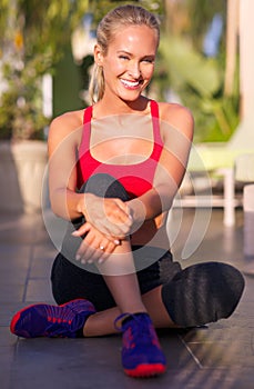 Happy woman, home and portrait for fitness outdoor with health, wellness and sportswear for workout on patio. Relax