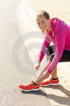 Happy woman jogger training in the park. Healthy lifestyle and p