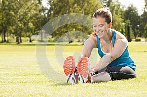Happy woman jogger training in the park. Healthy lifestyle and p