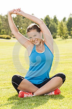 Happy woman jogger training in the park. Healthy lifestyle and p