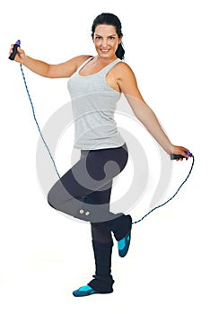 Happy woman with jump rope