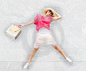 Happy woman jump with shopping bag