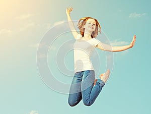 Happy woman jump in the sky