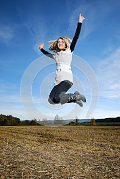 Happy woman jumps